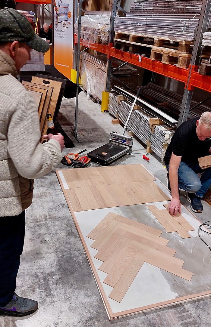 Demonstratie van LayOne parket van Lieverdink